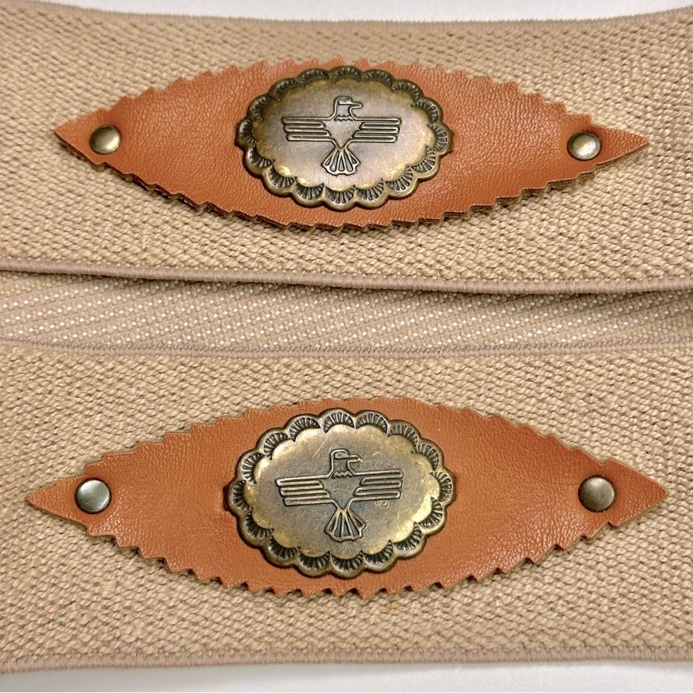 Vintage women’s stretch belt with faux leather and thunderbird details